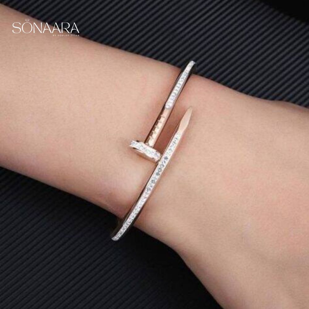 Rose Gold bracelet on a wrist with 'Sonaara' branding.