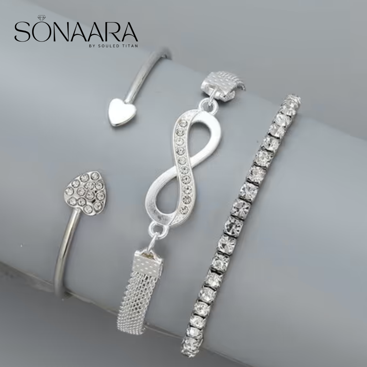 Silver jewelry set with 'Sonaara' branding on a gray surface