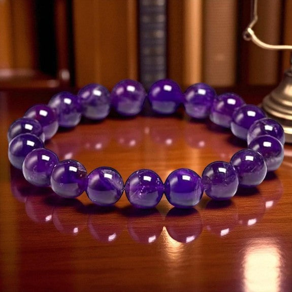 Authentic Amethyst bracelet on a wooden surface with a blurred background