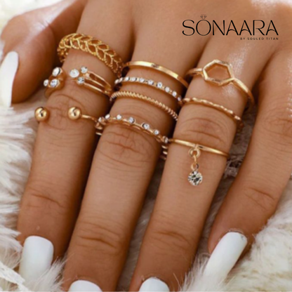 Multiple gold rings on fingers with 'Sonaara' branding.