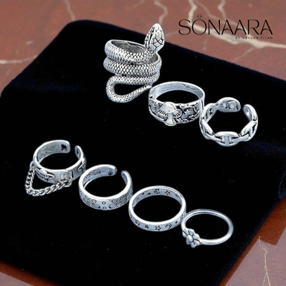 Set of silver rings on a black surface with 'Sonaara' branding.