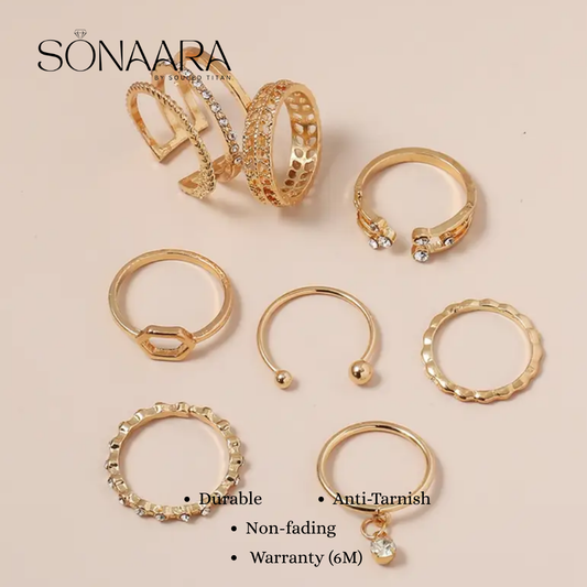 Gold jewelry set including rings and earrings on a beige background with 'Sonaara' branding.