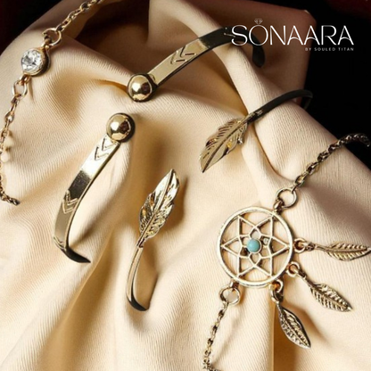Gold Plated Dream Catcher Boho Bracelet Set on a beige fabric background, featuring the brand 'SONAARA'.