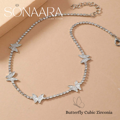 Butterfly-shaped cubic zirconia necklace on a beige background with 'Sonaara' branding.