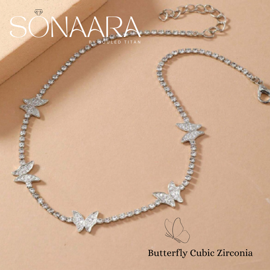 Butterfly-shaped cubic zirconia necklace on a beige background with 'Sonaara' branding.