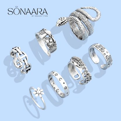 Collection of silver rings with intricate designs on a light blue background, branded as Sonaara by Souled Titan.