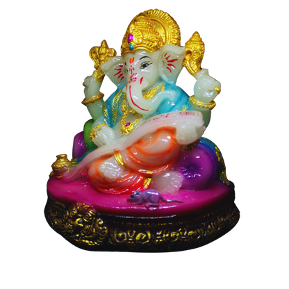 Colorful statue of a Ganapati with gold accents on a white background